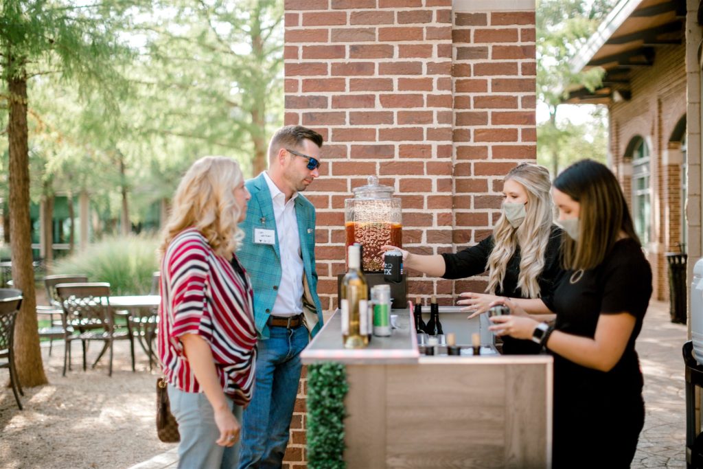 The Willows Event Center team serve drinks at bar during a corporate event